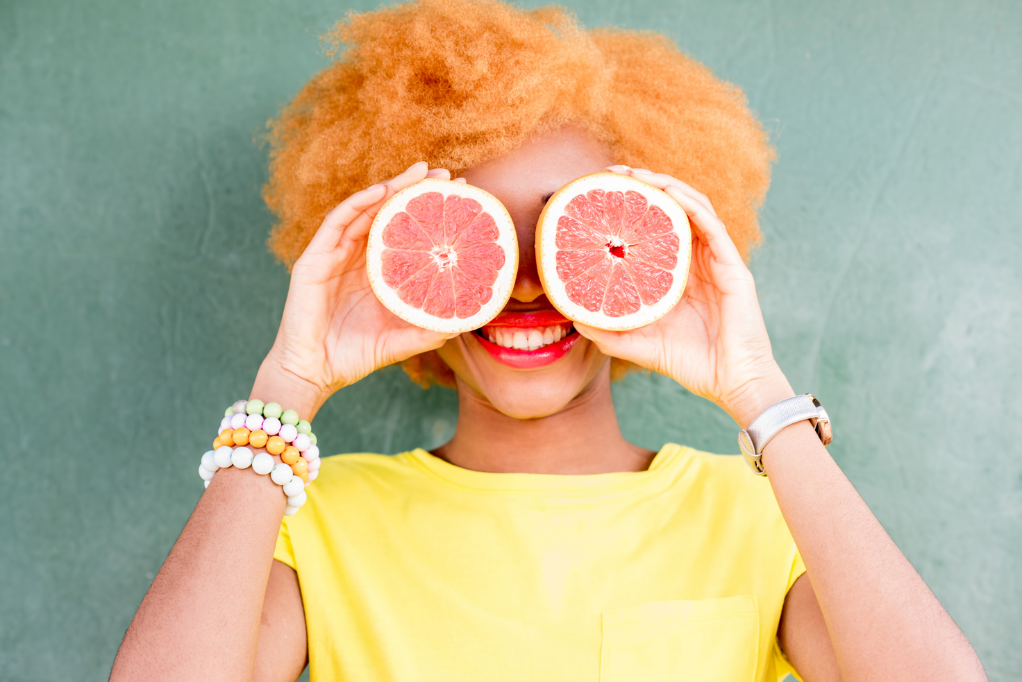African Woman with Grapefruit