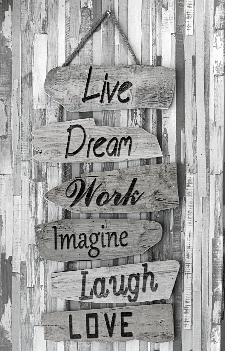 Pieces of wood forming six signs with meaningful words for life