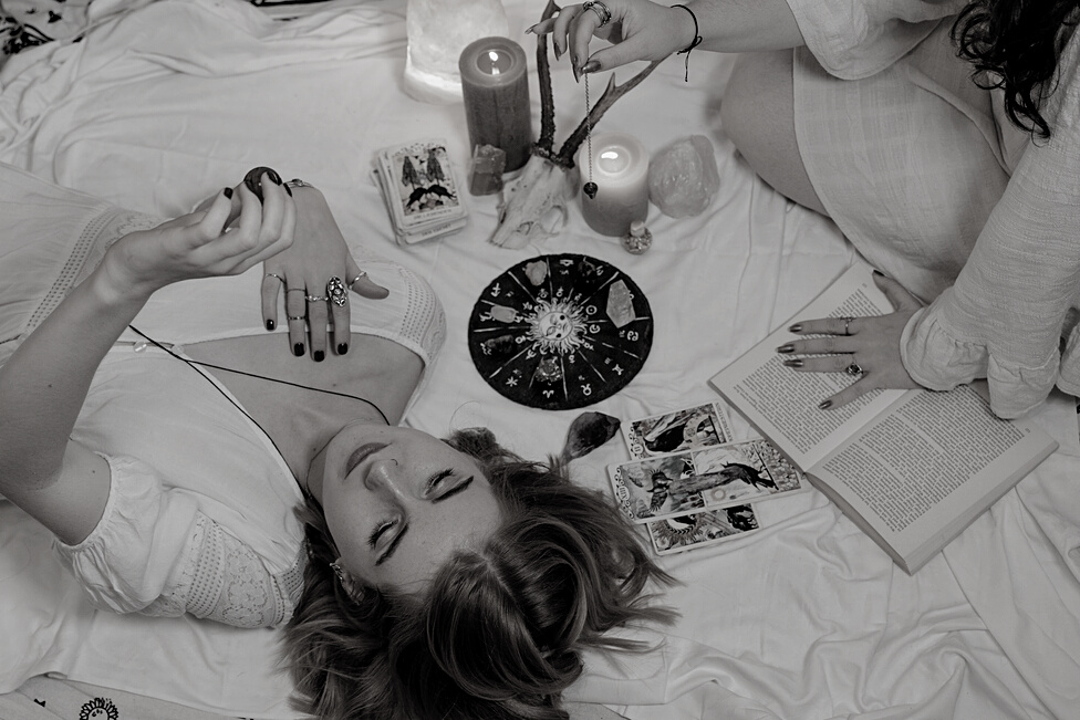 Women Practicing a Divination Ritual 