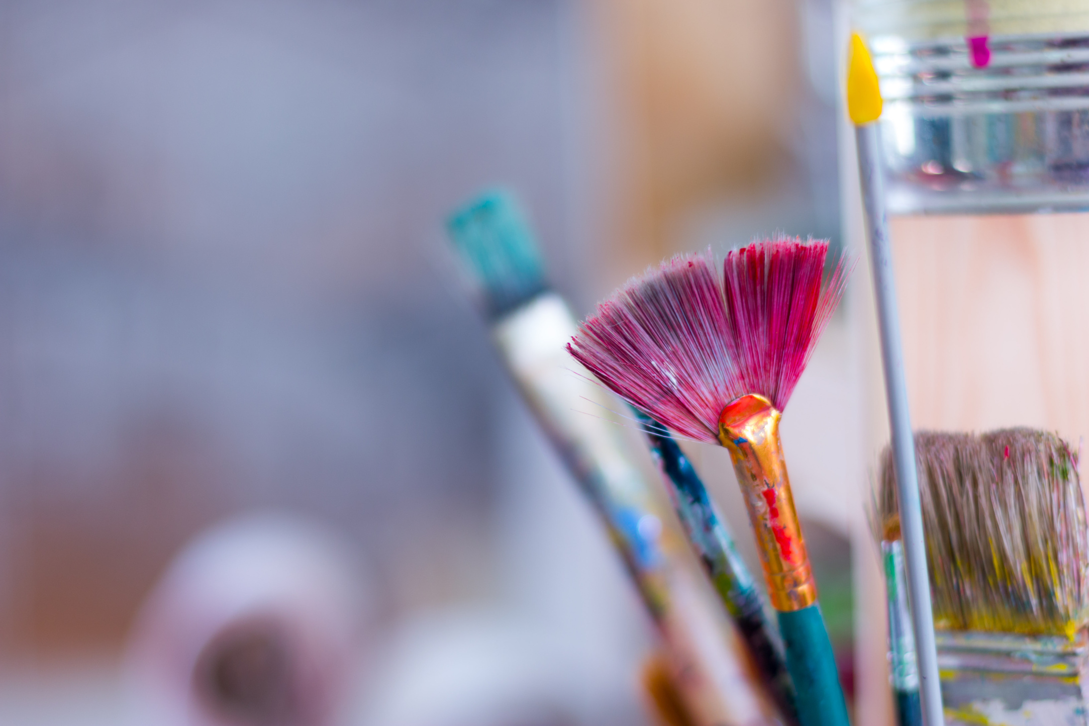 Painting artwork: paint brushes on painting background
